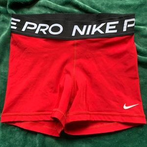 Size S Nike Pros in red, worn twice
